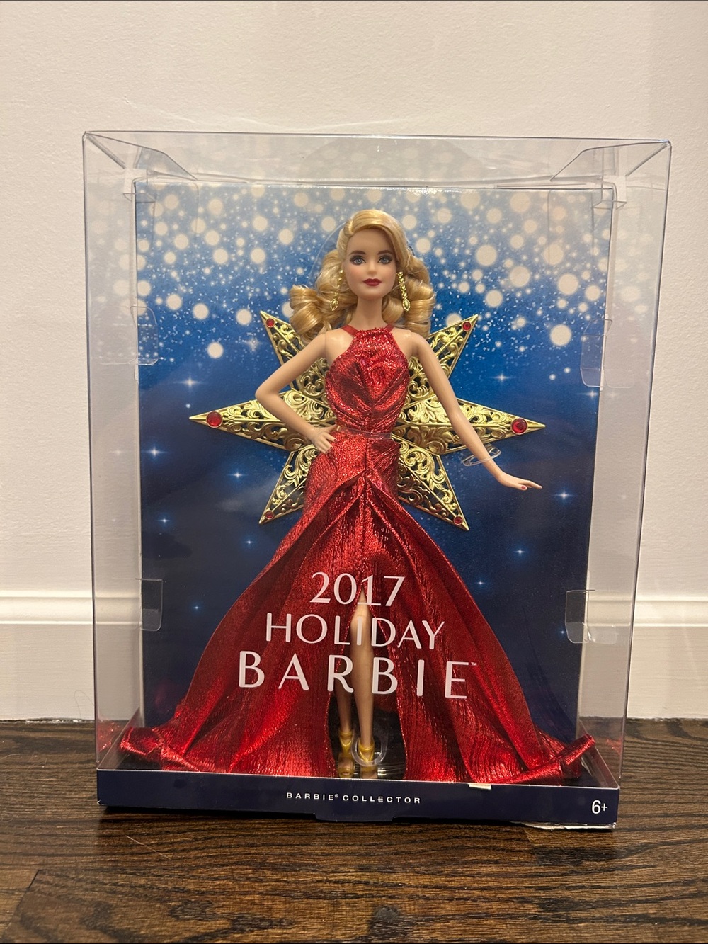 Mattel Barbie 2017 Holiday Doll in Red Gown with Gold Star Backpiece